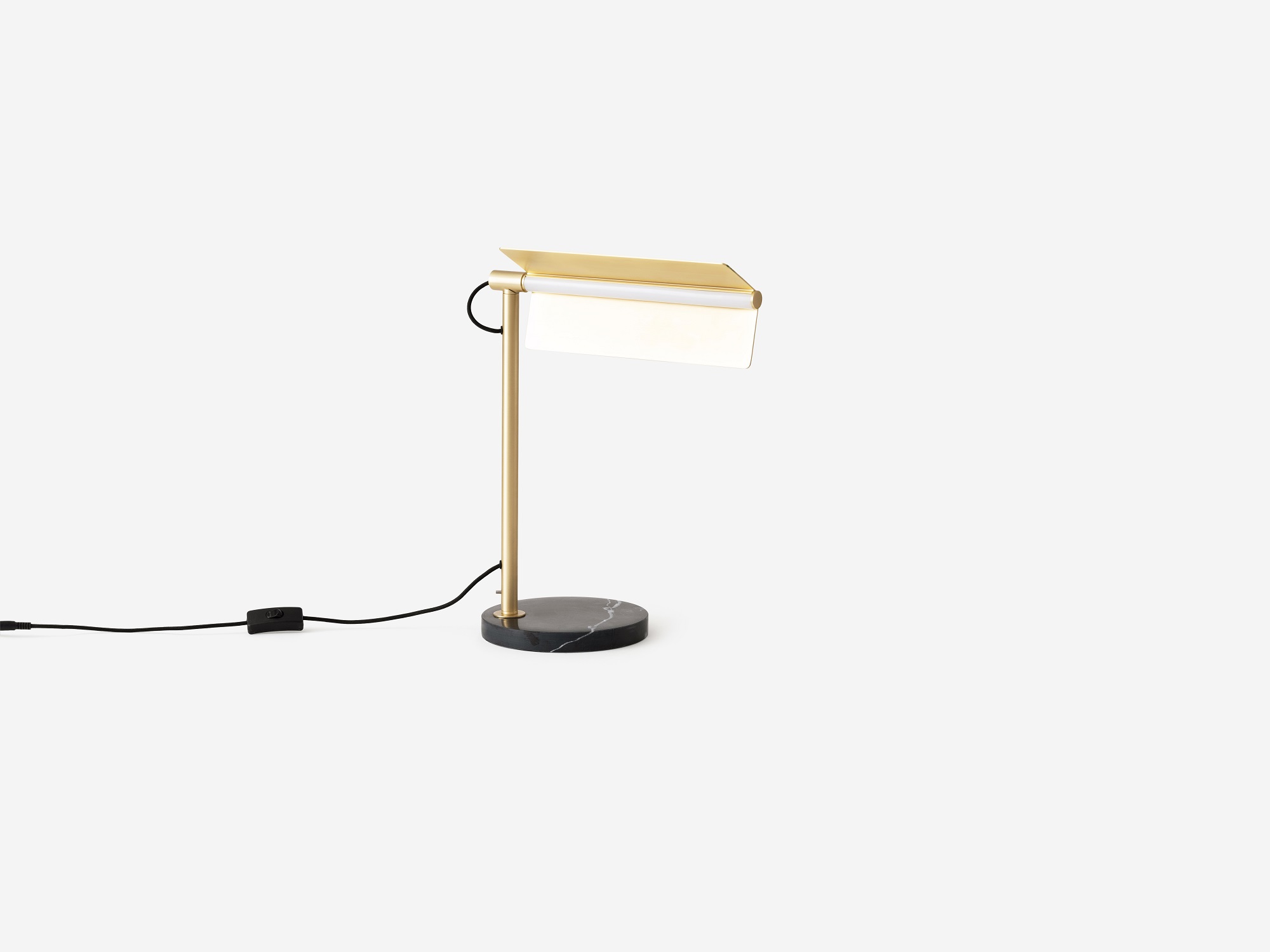 Angled view of the Oxford side table lamp in brass with shade angled up
